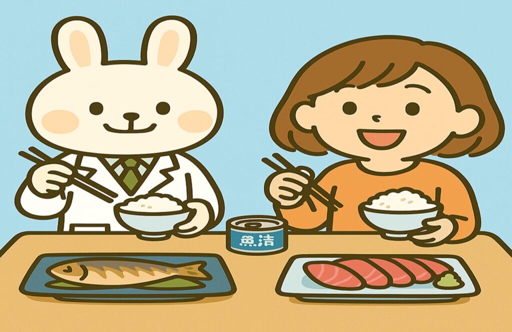 白衣を着たうさぎのキャラクター「みどりん」と、オレンジ色の服を着た女性キャラクター「すずちゃん」が一緒に魚定食を囲んで笑顔で食事をしているイラスト。テーブルの上にはサバ缶やお刺身、小鉢が並び、温かみのある雰囲気。